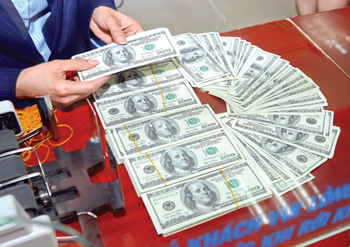 Overseas remittances to HMC are forecast to hit US$5.7 billion this year (Photo: SGGP) Overseas remittances to HMC are forecast to hit US$5.7 billion this year (Photo: SGGP)